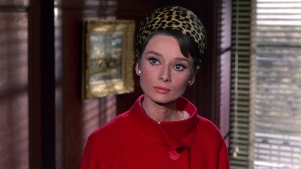 audrey hepburn with a red coat