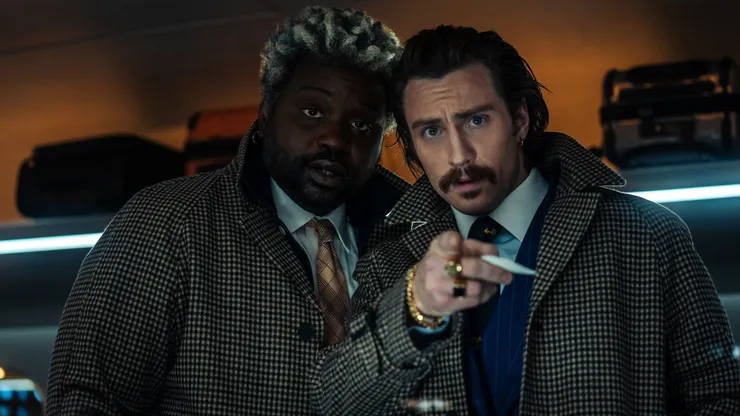 Aaron Taylor-Johnson and Brian Tyree Henry in Bullet Train.