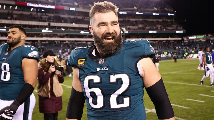 Jason Kelce #62 of the Philadelphia Eagles celebrates on the field after defeating the New York Giants 38-7 in the NFC Divisional Playoff game in 2023.