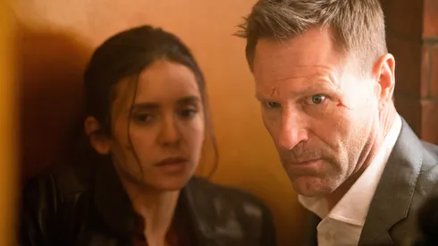 Aaron Eckhart and Nina Dobrev in The Bricklayer.