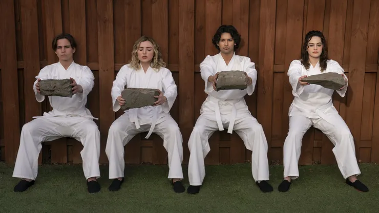 Mary Mouser, Peyton List, Tanner Buchanan and Xolo Maridueña in Cobra Kai.