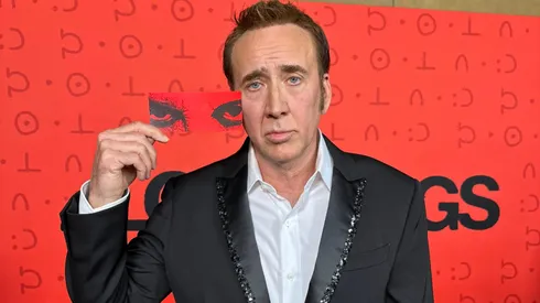 Nicolas Cage with his ticket to the premiere.
