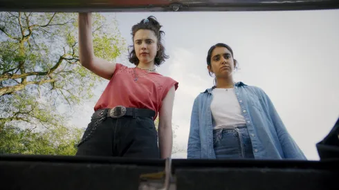 Margaret Qualley and Geraldine Viswanathan in "Drive-Away Dolls".