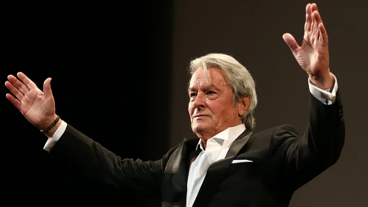 Alain Delon appears on stage during a Tribute To Alain Delon at Theatre Lumiere during The 66th Annual Cannes Film Festival at the Palais des Festivals on May 25, 2013 in Cannes, France.