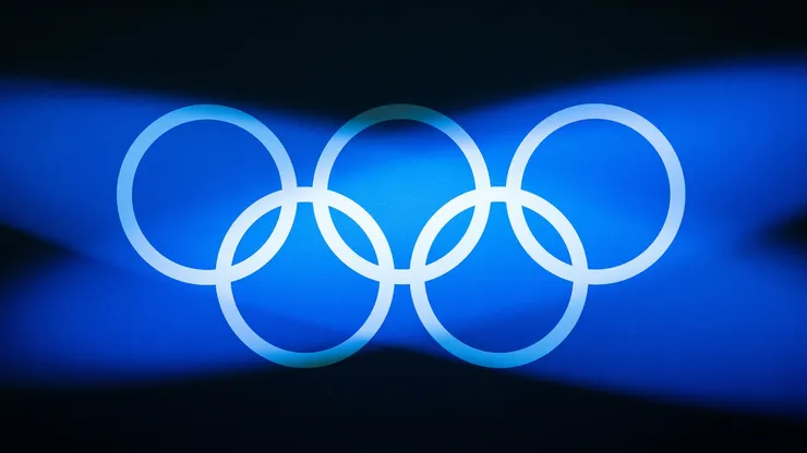 The Olympic rings are illuminated in the stage ahead of the Weightlifting Men's 89kg on day fourteen of the Olympic Games Paris 2024 at South Paris Arena on day fourteen of the Olympic Games Paris 2024 at South Paris Arena on August 09, 2024 in Paris, France.