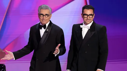Hosts Eugene Levy and Dan Levy speak onstage during the 76th Primetime Emmy Awards at Peacock Theater on September 15, 2024 in Los Angeles, California.