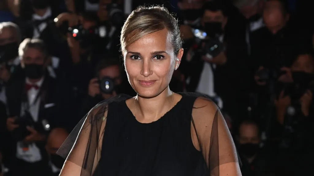 Julia Ducournau poses with the Palme d’Or ‘Best Movie Award’ for ‘Titane’ during the 74th annual Cannes Film Festival on July 17, 2021 in Cannes, France. (Photo by Pascal Le Segretain/Getty Images)