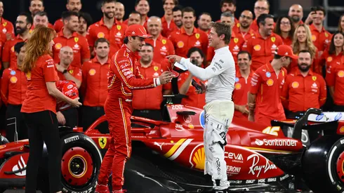 Brad Pitt, star of the upcoming Formula One based movie, F1, talks with Charles Leclerc of Monaco and Ferrari at the Ferrari team photo during previews ahead of the F1 Grand Prix of Abu Dhabi at Yas Marina Circuit on December 05, 2024 in Abu Dhabi, United Arab Emirates. (Photo by Clive Mason/Getty Images)