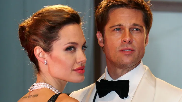 Angelina Jolie and Brad Pitt attend the The Assassination of Jesse James by the Coward Robert Ford premiere on the Day 5 of the 64th Annual Venice Film Festival on September 2, 2007 in Venice, Italy. (Photo by MJ Kim/Getty Images)