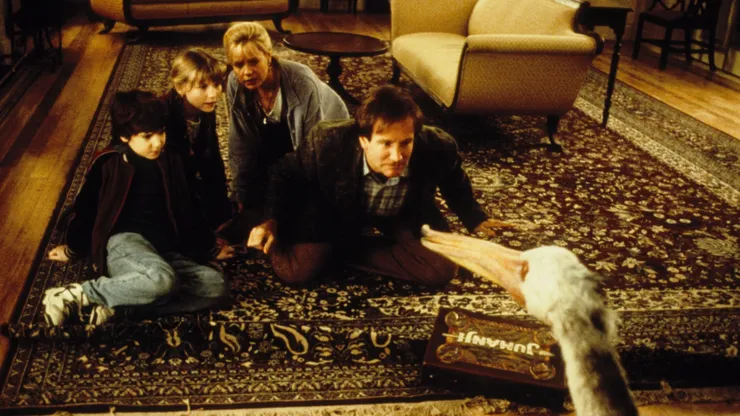 Robin Williams, Kirsten Dunst, Bonnie Hunt, and Bradley Pierce in Jumanji (1995)