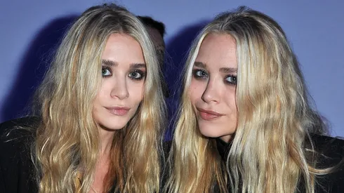 Mary-Kate Olsen and Ashley Olsen attend the Dw by Kanye West Ready to Wear Spring / Summer 2012 show during Paris Fashion Week.
