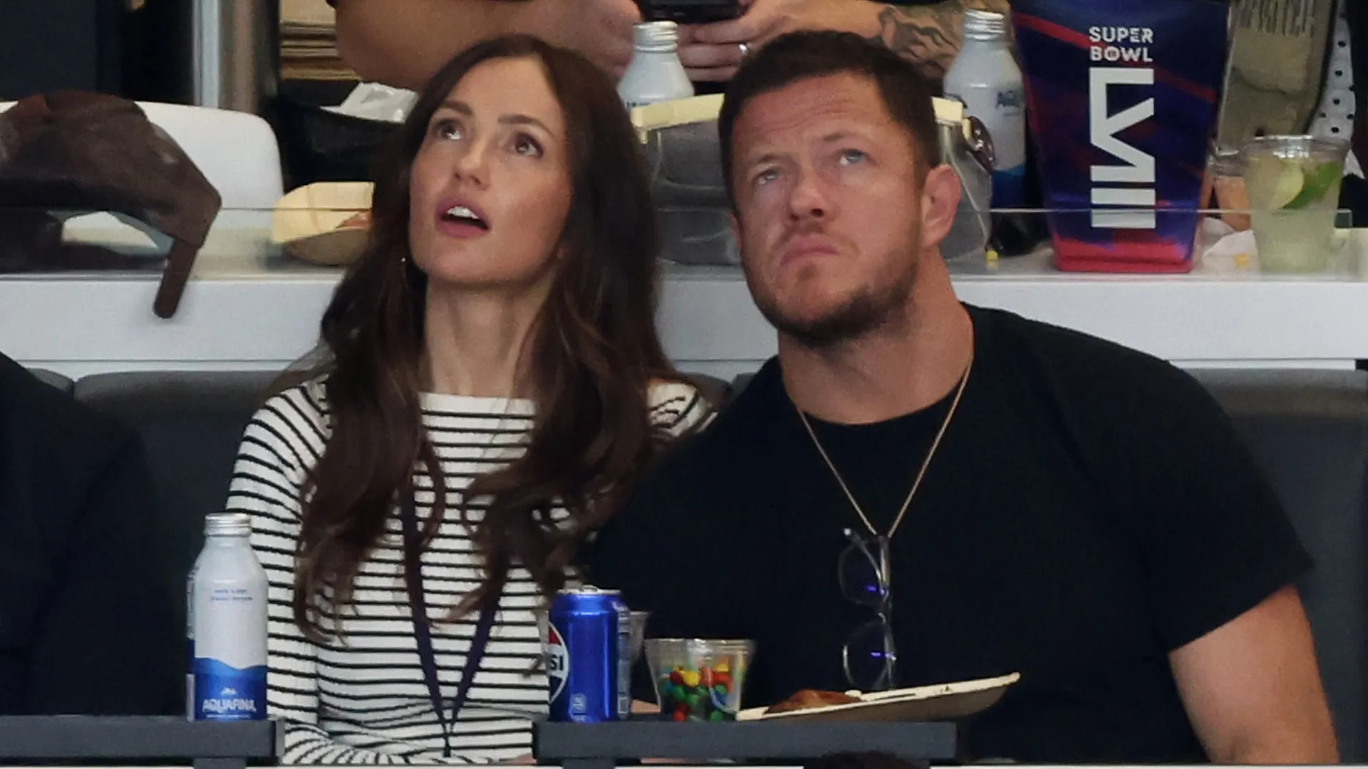 Minka Kelly and Dan Reynolds look on in the first quarter during Super Bowl LVIII in 2024. (Source: Rob Carr/Getty Images)