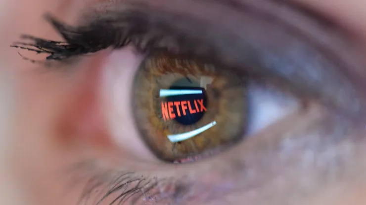 In this photo illustration the Netflix logo is reflected in the eye of a woman on September 19, 2014 in Paris, France.