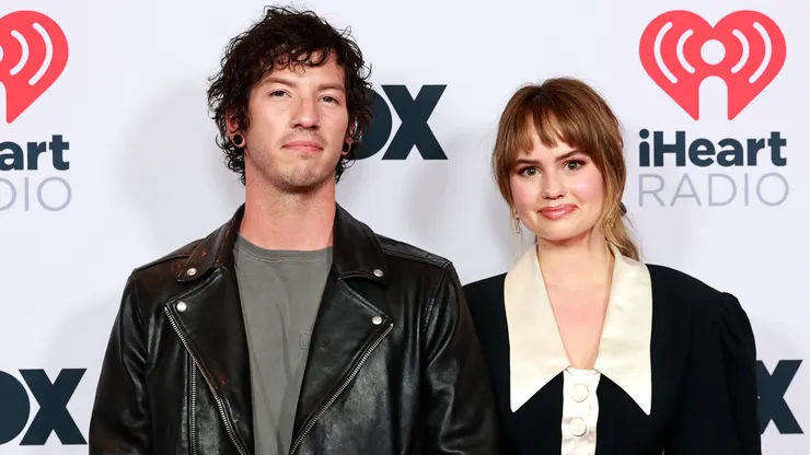 Josh Dun of music group Twenty One Pilots and Debby Ryan attend the 2021 iHeartRadio Music Awards at The Dolby Theatre in Los Angeles, California, which was broadcast live on FOX on May 27, 2021. (Photo by Emma McIntyre/Getty Images for iHeartMedia)