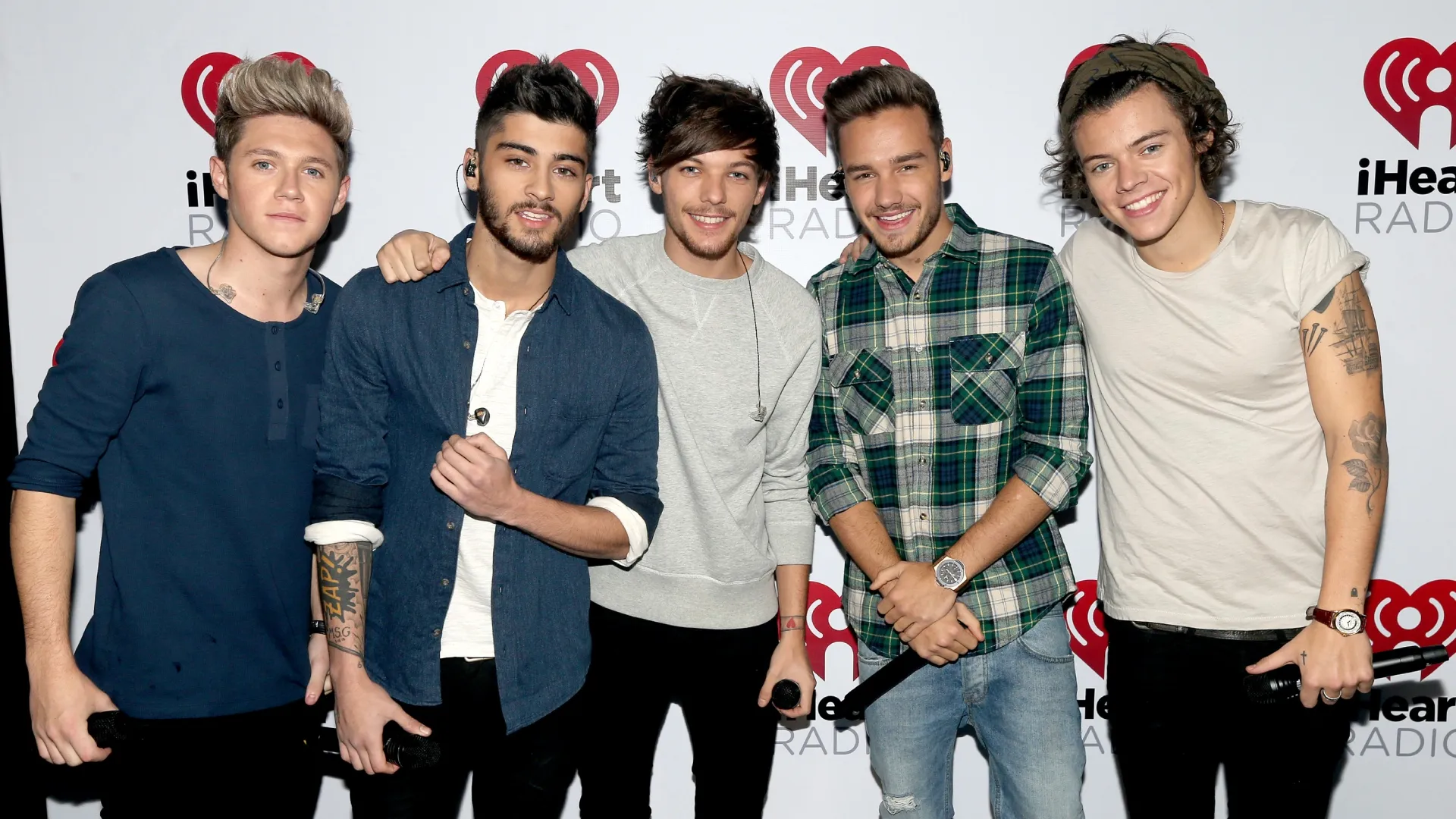 (L-R) Musicians Niall Horan, Zayn Malik, Louis Tomlinson, Liam Payne, and Harry Styles of the band One Direction during the “One Direction iHeartRadio Album Release Party” hosted by Ryan Seacrest at the iHeartRadio Theater Los Angeles  Clear Channel’s new music and events venue located at The Burbank Studios in Burbank, CA (Photo by Christopher Polk/Getty Images for Clear Channel)
