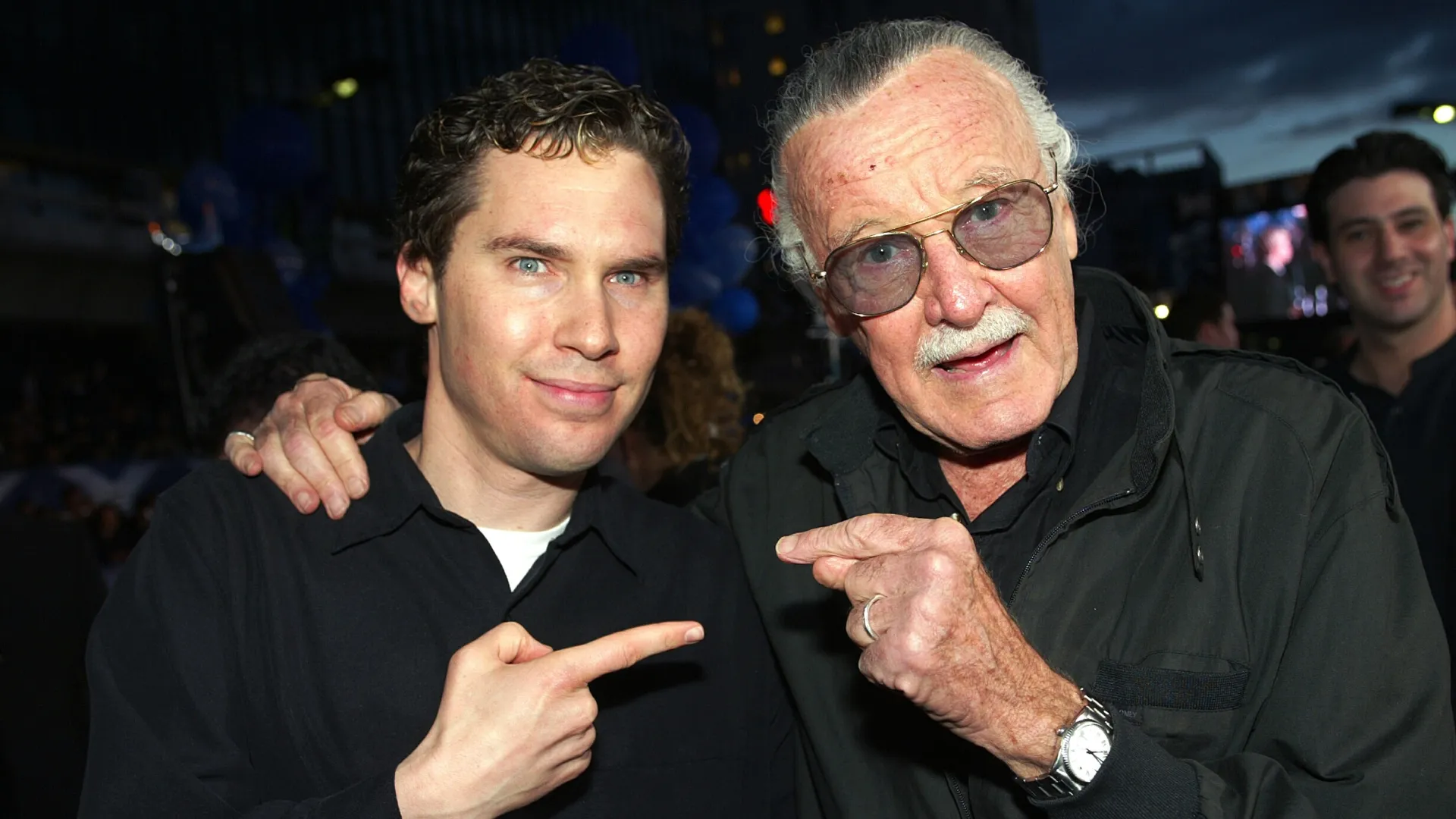 Director Bryan Singer (L) and X-Men creator Stan Lee pose at the premiere of “X2: X-MEN UNITED” at the Chinese Theatre on April 28, 2003 in Los Angeles, California. (Photo by Kevin Winter/Getty Images)