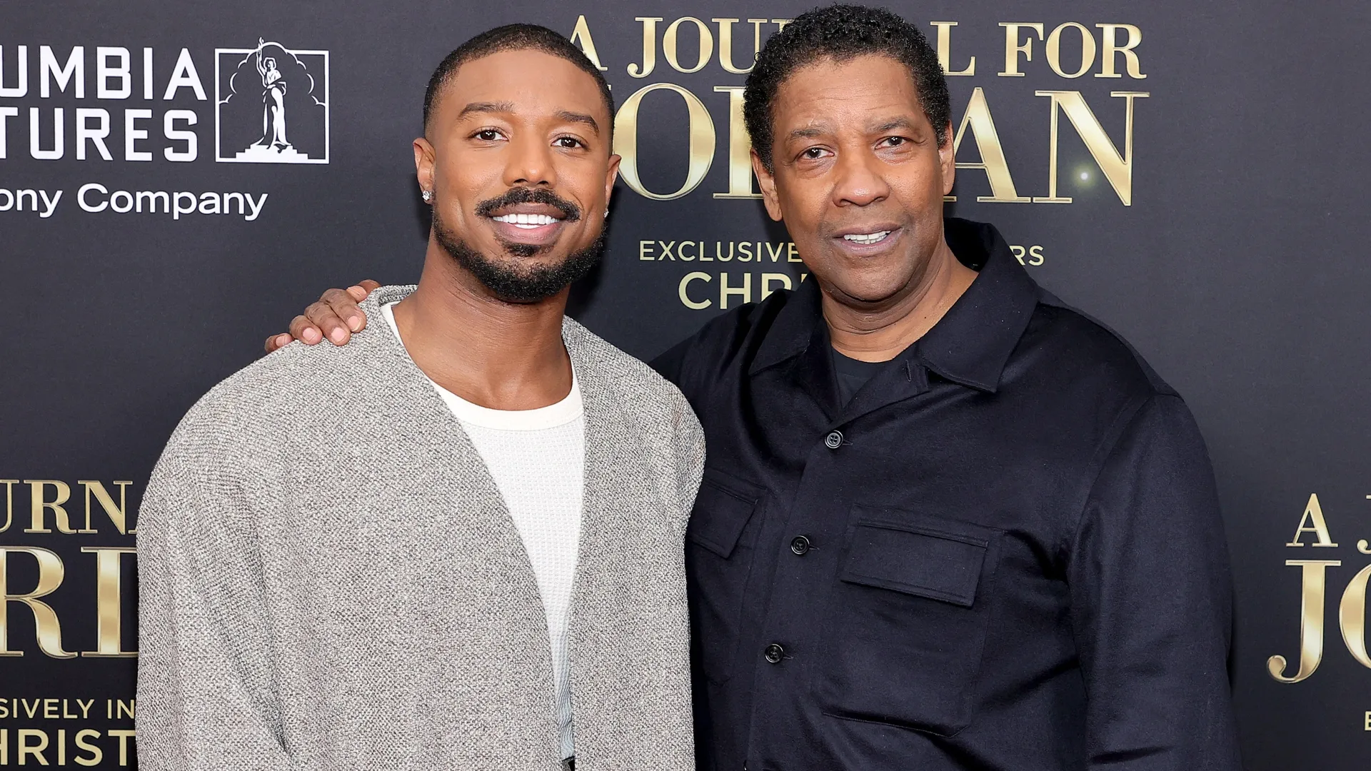 Michael B. Jordan and Denzel Washington attend the world premiere of “A Journal For Jordan” at AMC Lincoln Square Theater on December 09, 2021 in New York City. (Photo by Theo Wargo/Getty Images for Sony Pictures)