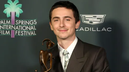 Timothée Chalamet poses with the Spotlight Award for "Marty Supreme" in the press room during the 37th Annual Palm Springs International Film Festival Film Awards at Palm Springs Convention Center on January 03, 2026 in Palm Springs, California.