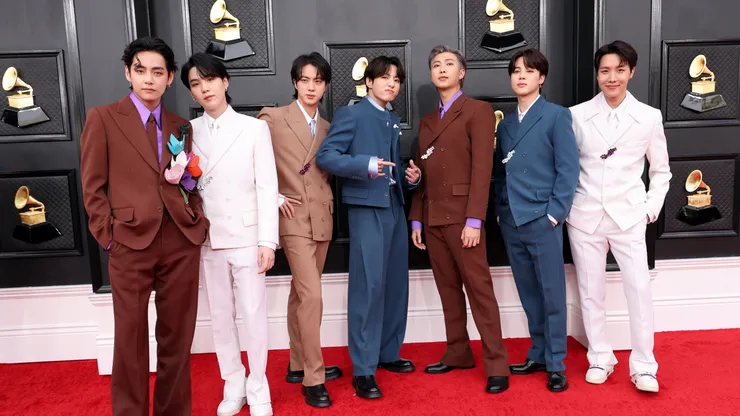 (L-R) V, Suga, Jin, Jungkook, RM, Jimin and J-Hope of BTS attend the 64th Annual GRAMMY Awards at MGM Grand Garden Arena on April 03, 2022 in Las Vegas, Nevada.