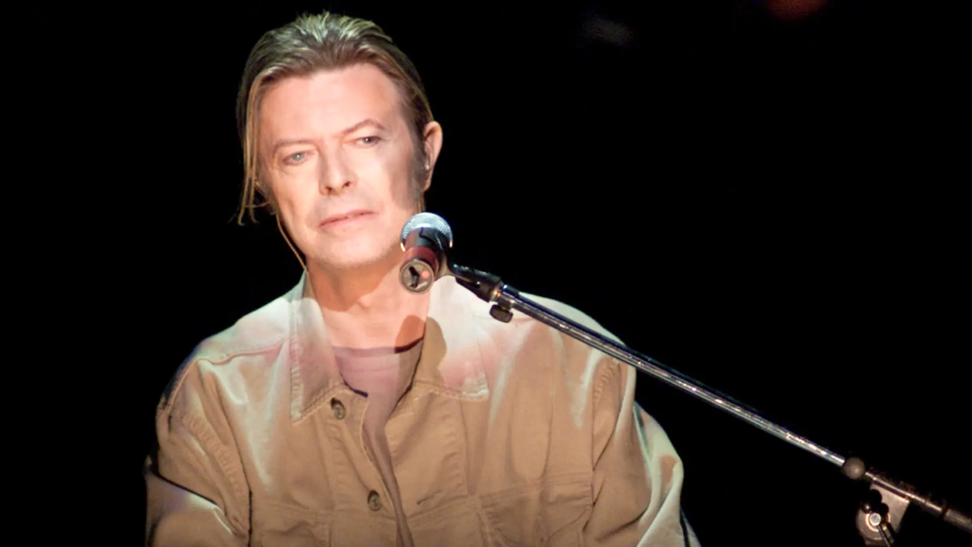 David Bowie performing onstage at The Concert for New York City to benefit the victims of the World Trade Center disaster in 2001. (Source: Scott Gries/ImageDirect)
