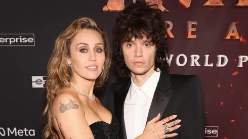 Miley Cyrus and Maxx Morando attend the world premiere of 20th Century Studios "Avatar: Fire and Ash" at The Dolby Theatre in Hollywood.