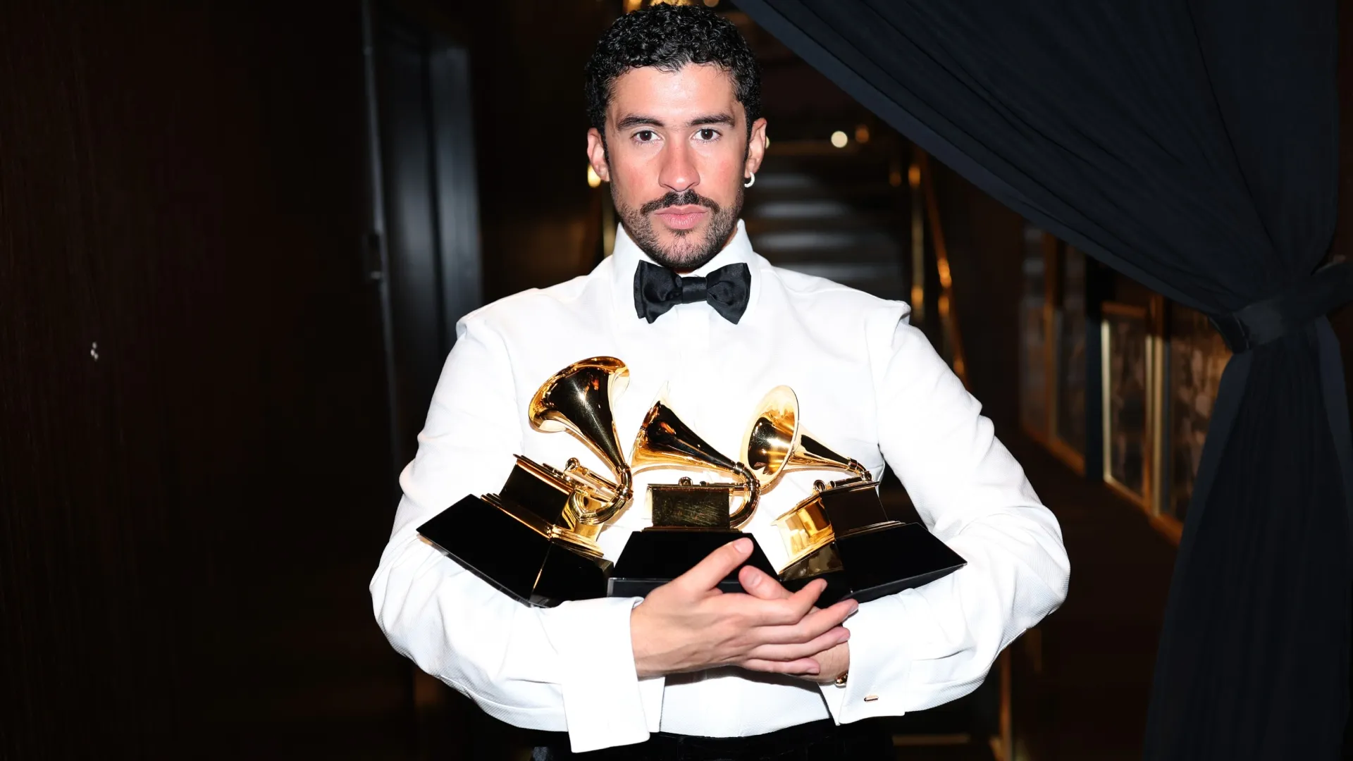 Bad Bunny poses with the Album of the Year, Best Música Urbana Album, and Best Global Music Performance Awards during the 68th GRAMMY Awards at Crypto.com Arena on February 01, 2026 in Los Angeles, California. (Photo by Matt Winkelmeyer/Getty Images for The Recording Academy)