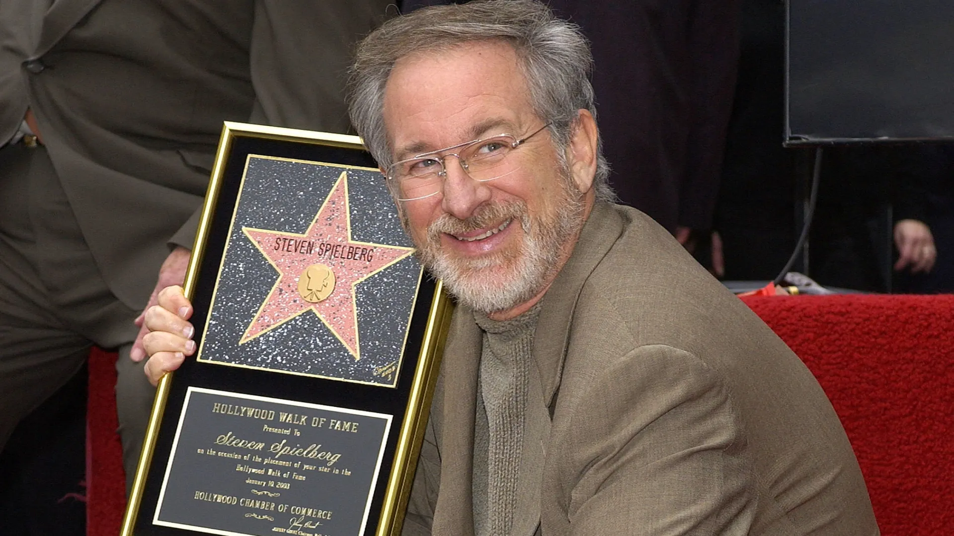 Academy Award winning director Steven Spielberg poses at a ceremony honoring him with a star on the Hollywood Walk of Fame on January 10, 2003 at the Kodak Theatre in Hollywood, California. (Photo by Vince Bucci/Getty Images)