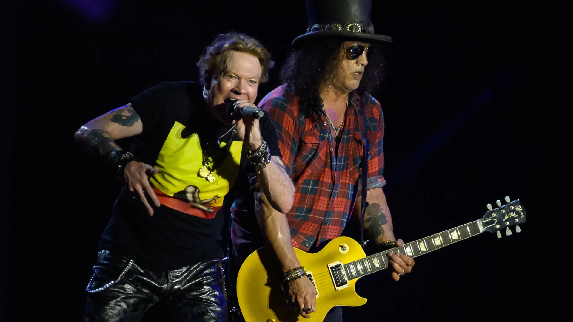 Axl Rose (L) and Slash of Guns ‘n’ Roses perform on the Pyramid Stage on Day 4 of Glastonbury Festival 2023 on June 24, 2023 in Glastonbury, England. The Glastonbury Festival of Performing Arts sees musicians, performers and artists come together for three days of live entertainment. (Photo by Leon Neal/Getty Images)