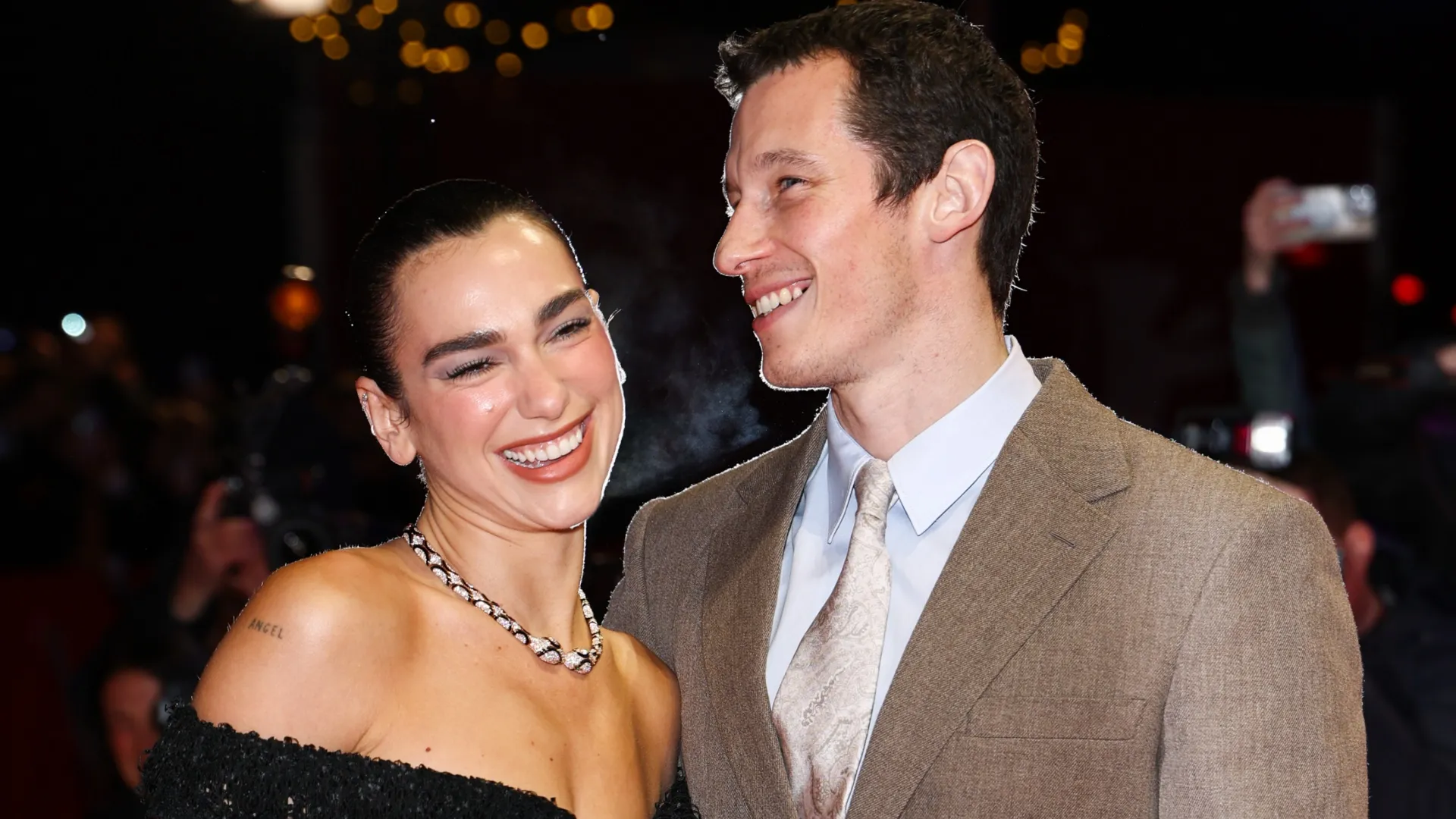 Dua Lipa and Callum Turner attend the “Rosebush Pruning” premiere during the 76th Berlinale International Film Festival Berlin at Berlinale Palast on February 14, 2026 in Berlin, Germany. (Photo by Arturo Holmes/Getty Images)