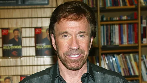 Actor Chuck Norris poses during a book signing for his new book "Against All Odds" at Borders Books.