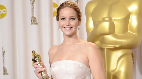 Jennifer Lawrence poses in the press room during the Oscars held in 2013.