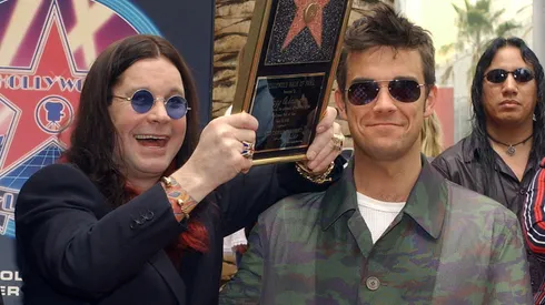 Musician Ozzy Osbourne (C) attends the ceremony honoring him with a star on the Hollywood Walk of Fame.