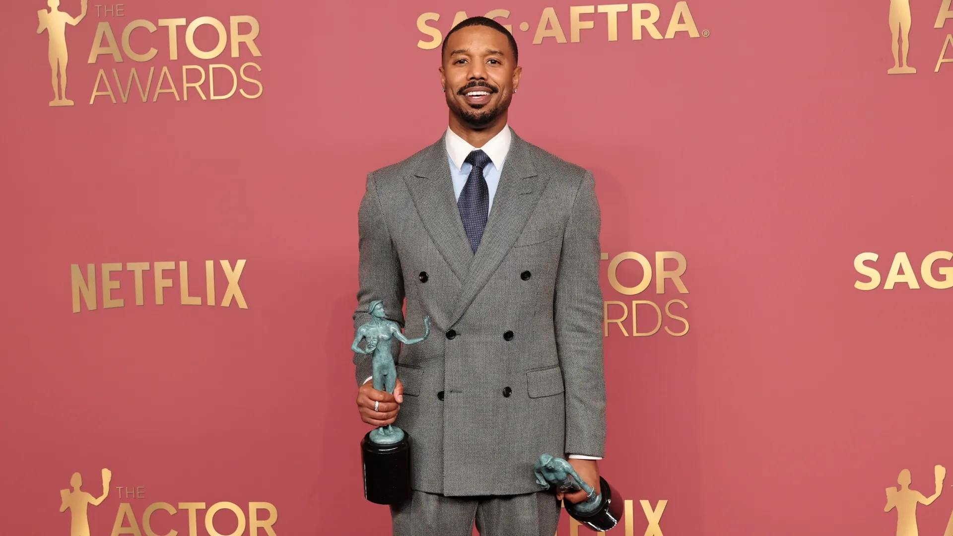 Michael B. Jordan, winner of the Outstanding Performance by a Male Actor in a Leading Role award and the Outstanding Performance by a Cast in a Motion Picture award for “Sinners,” poses in the press room during the 32nd Annual Actor Awards at Shrine Auditorium and Expo Hall on March 01, 2026 in Los Angeles, California. (Photo by Amy Sussman/Getty Images)
