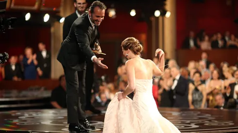 Jennifer Lawrence accepts the award for Actress in a Leading Role onstage during the Oscars in 2013.
