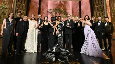 In this handout photo provided by The Academy, the cast and crew of Best Picture winner "One Battle After Another" pose during the 98th Oscars at Dolby Theatre on March 15, 2026 in Hollywood, California.