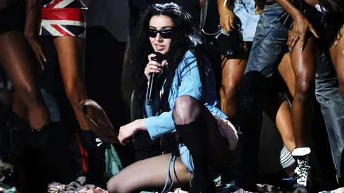 Charli XCX (C) performs onstage during the 67th Annual GRAMMY Awards.