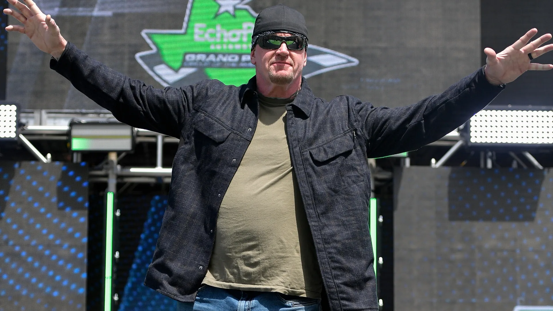 The Undertaker walks onstage during pre-race ceremonies prior to the NASCAR Cup Series Echopark Automotive Grand Prix 2022 (Source: Logan Riely/Getty Images)