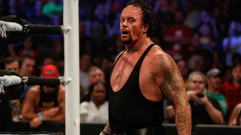 The Undertaker recovers during his fight against Brock Lesner at the WWE SummerSlam 2015.