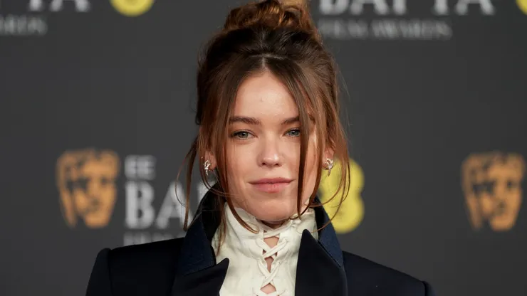 Milly Alcock attends the EE BAFTA Film Awards 2026.