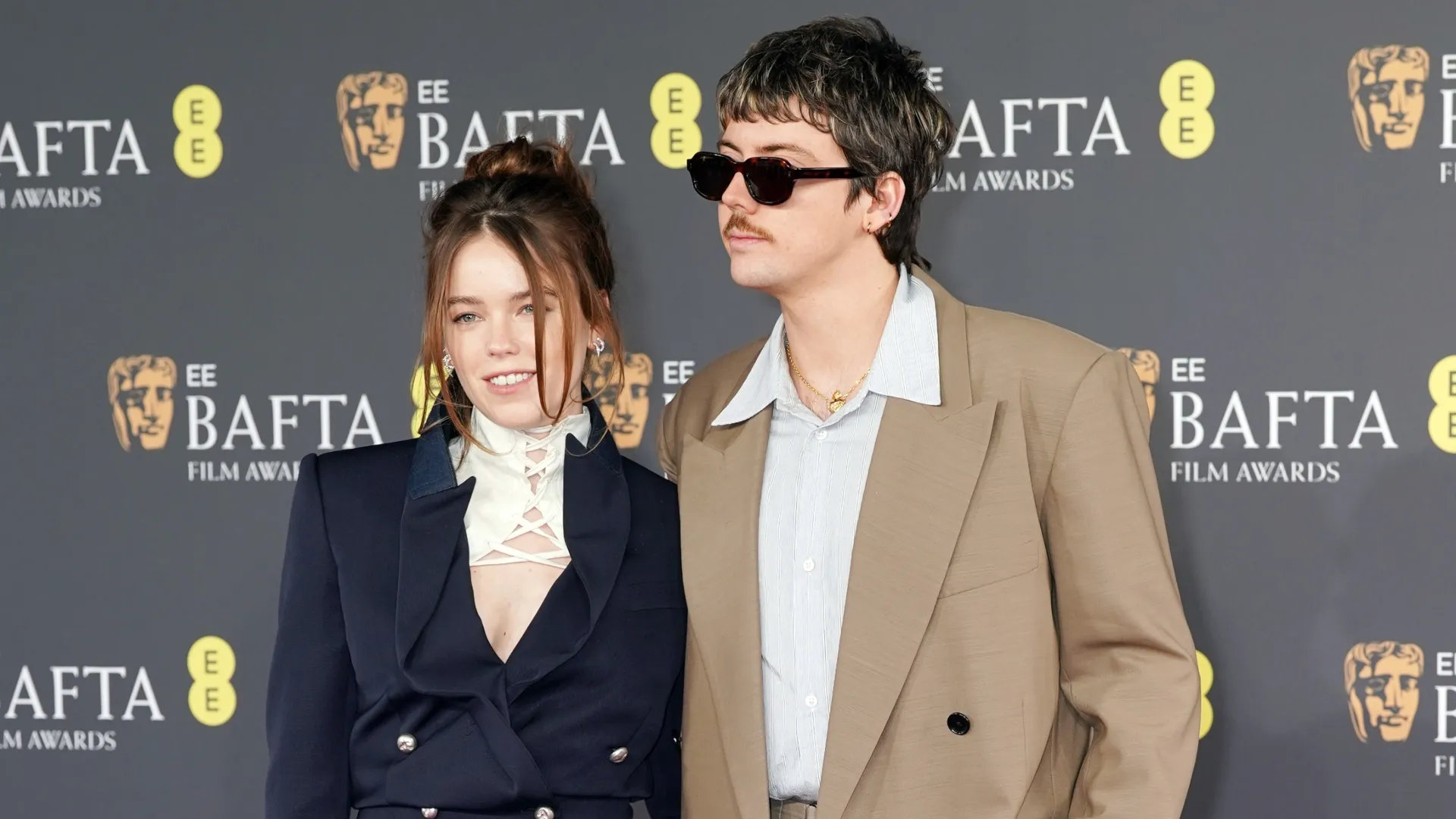 Milly Alcock and Joseph Powell attend the EE BAFTA Film Awards 2026 (Source: Dominic Lipinski/Getty Images)