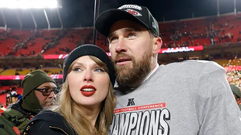 Taylor Swift celebrates with Travis Kelce #87 of the Kansas City Chiefs after defeating the Buffalo Bills 32-29 in the AFC Championship Game.