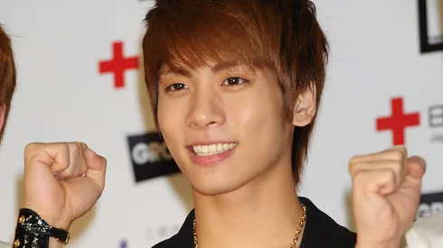 SHINee pose for photographs on the red carpet during the MTV Video Music Aid Japan at Makuhari Messe.