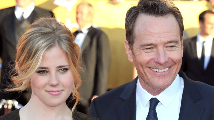Taylor Cranston, Bryan Cranston, and Robin Dearden arrive at the 18th Annual Screen Actors Guild Awards at The Shrine Auditorium.