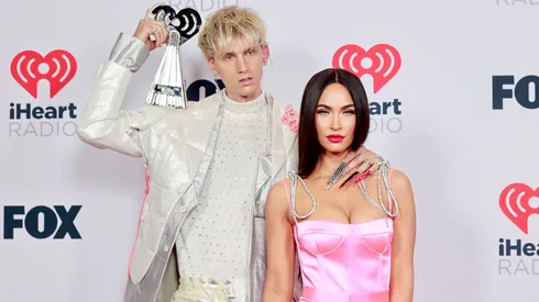Machine Gun Kelly, winner of the Alternative Rock Album of the Year award for 'Tickets To My Downfall,’ and Megan Fox attend the 2021 iHeartRadio Music Awards at The Dolby Theatre in Los Angeles, California, which was broadcast live on FOX on May 27, 2021.