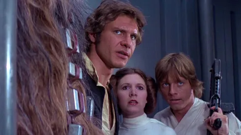Harrison Ford, Carrie Fisher, Mark Hamill, and Peter Mayhew in 'Star Wars' (1977)