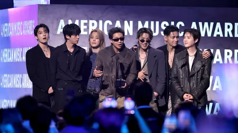 (L-R) Jungkook, Jin, Jimin, RM, J-Hope, V and Suga of BTS accept the Artist of the Year award onstage during the 52nd American Music Awards at MGM Grand Garden Arena on May 25, 2026 in Las Vegas, Nevada.