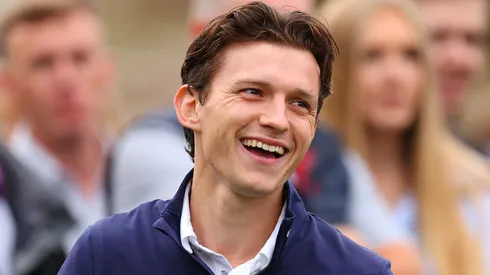 Tom Holland smiles on the 1st tee during the Pro-Am prior to the BMW PGA Championship at Wentworth Golf Club.