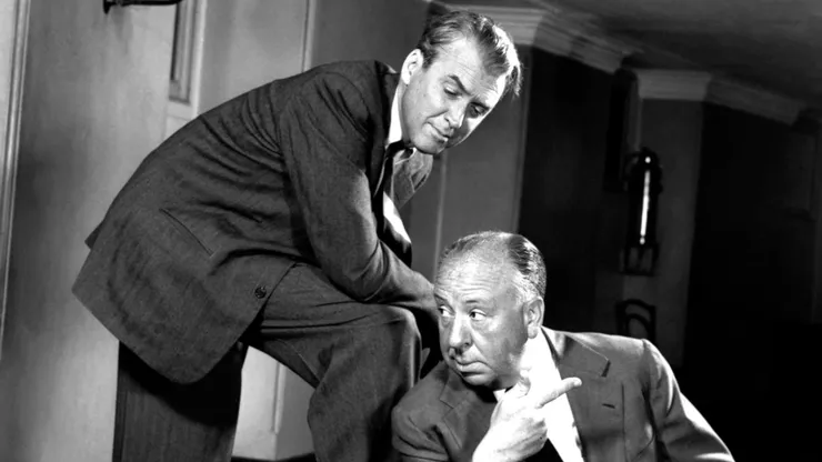 Alfred Hitchcock and James Stewart.