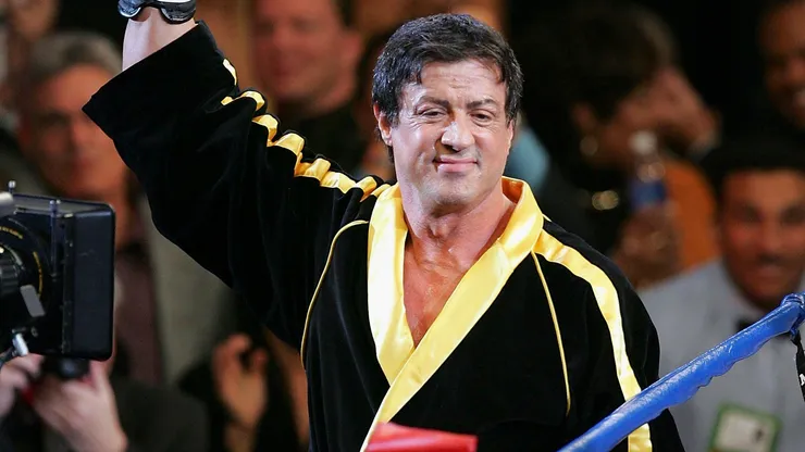 Actor Sylvester Stallone waves to the crowd as scenes from the film "Rocky VI" are filmed before the start of the Bernard Hopkins and Jermain Taylor fight at the Mandalay Bay Events Center on December 3, 2005 in Las Vegas, Nevada.