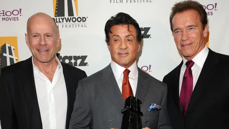 Actor Bruce Willis, producer/actor Sylvester Stallone, and Governor Arnold Schwarzenegger pose during the 14th annual Hollywood Awards Gala at The Beverly Hilton Hotel on October 25, 2010 in Beverly Hills, California.